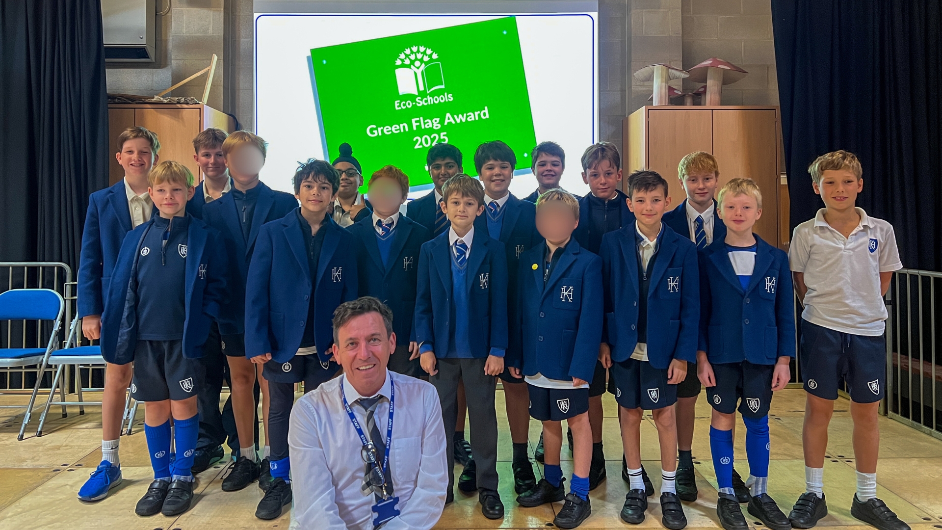 Eco Warrior Students with teacher getting an award.